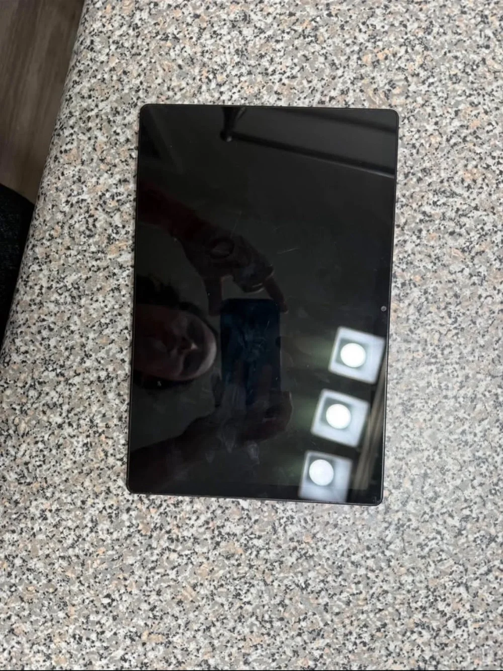 Samsung Tablet with Black Bezel and Blue Accent Display